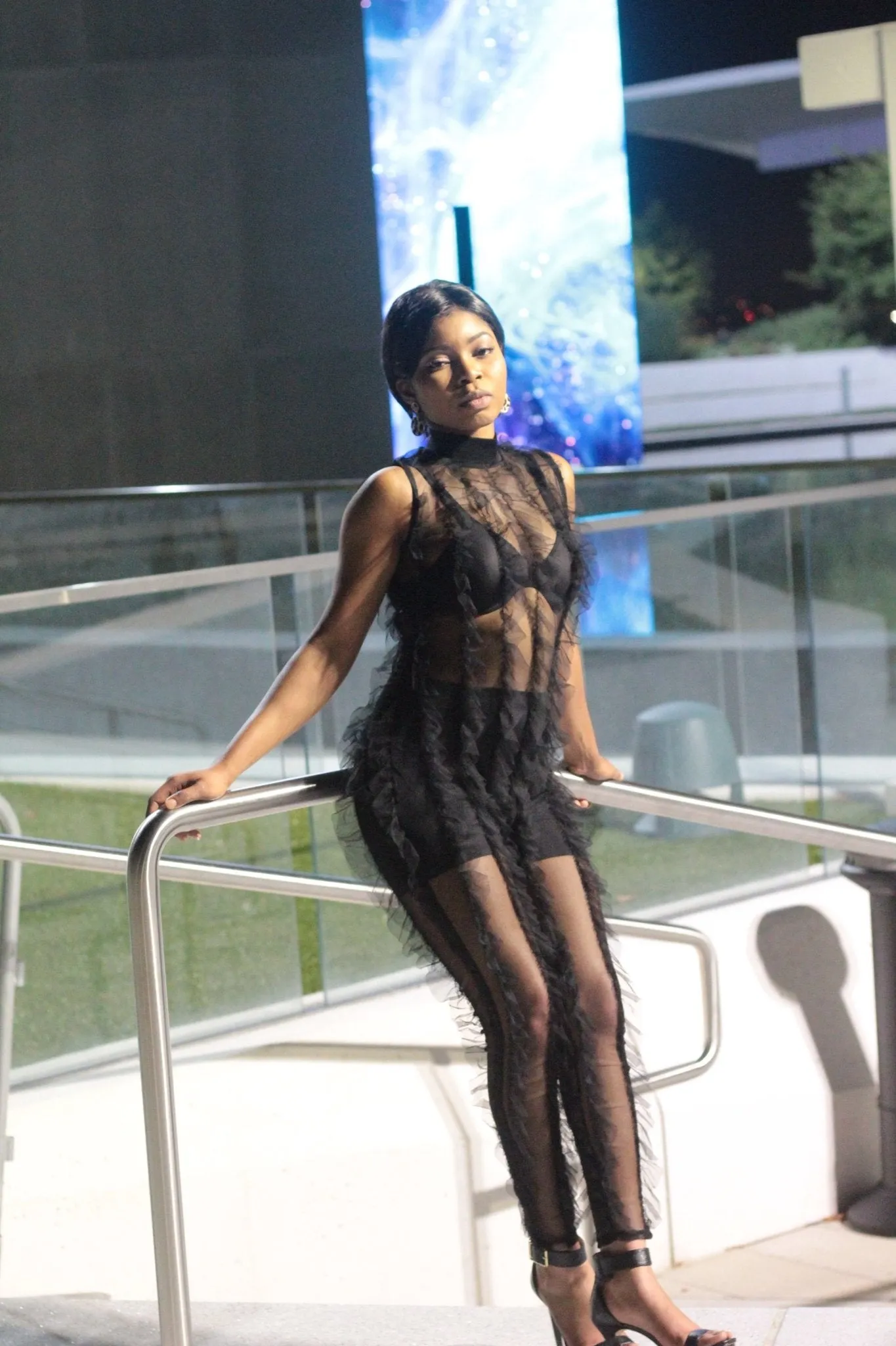 RUFFLE SHEER JUMPSUIT
